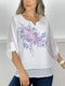 T224 Blusa blanca con estampado floral