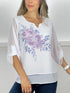 T224 Blusa blanca con estampado floral