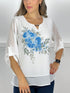 T224 Blusa blanca con estampado floral