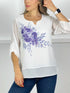 T224 Blusa blanca con estampado floral